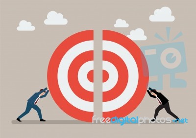 Two Businessmans Pushing A Pieces Of Big Target Together Stock Image
