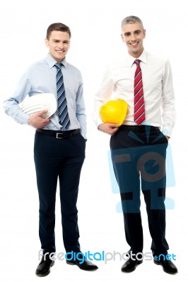 Two Businessmen With Hard Hats Stock Photo