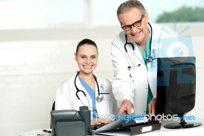 Two Cheerful Doctors At Hospital Stock Photo