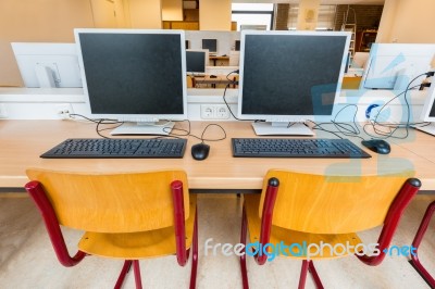 Two Computers In Classroom On High School Stock Photo