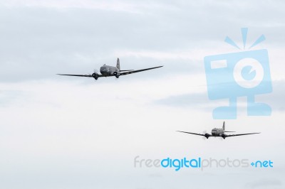 Two Douglas C-47 Skytrains  Flying Over Shoreham Airfield Stock Photo