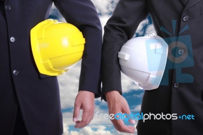 Two Engineer Hold Planing Project Paper Stock Photo