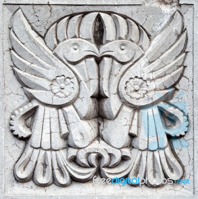 Two Fairy Crows, Bas-relief Stock Photo