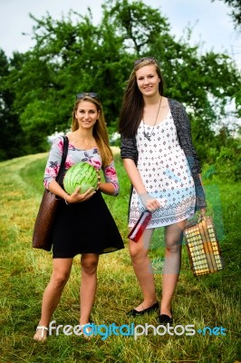 Two Girls Getting Ready For A Picnic Stock Photo