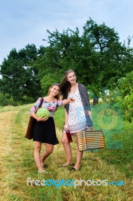 Two Girls Getting Ready For A Picnic Stock Photo