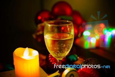 Two Glasses Of Champagne With A Christmas Decor In The Background Stock Photo