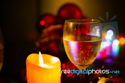 Two Glasses Of Champagne With A Christmas Decor In The Background Stock Photo