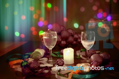 Two Glasses Of Champagne With A Christmas Decor In The Background Stock Photo