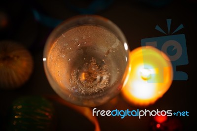 Two Glasses Of Champagne With A Christmas Decor In The Background Stock Photo