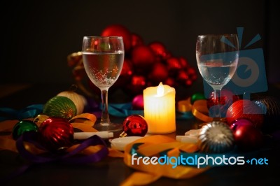 Two Glasses Of Champagne With A Christmas Decor In The Background Stock Photo