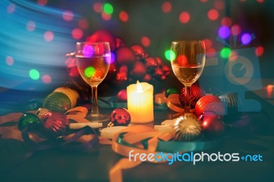 Two Glasses Of Champagne With A Christmas Decor In The Background Stock Photo