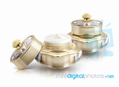 Two Golden Crown Cosmetic Jar On White Background Stock Photo