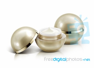 Two Golden Sphere Cosmetic Jar On White Background Stock Photo