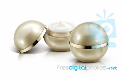 Two Golden Sphere Cosmetic Jar On White Background Stock Photo