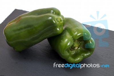 Two Green Bell Peppers Stock Photo