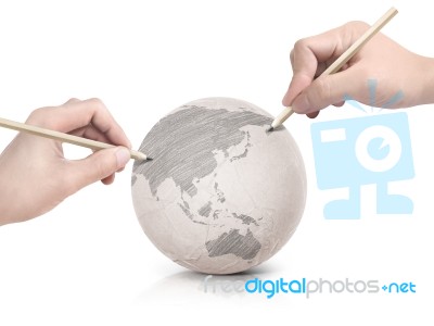 Two Hand Shade Drawing Asia Map On Paper Ball Stock Photo