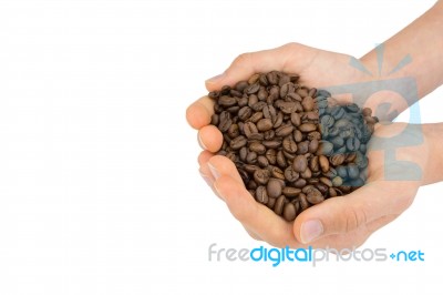 Two Hands Holding Coffee Beans Stock Photo