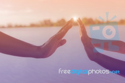 Two Hands Holding Puzzle Mother And Child Stock Photo