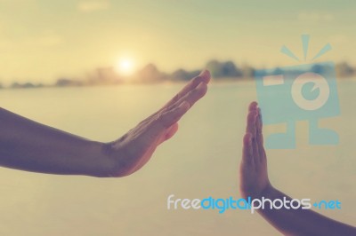 Two Hands Holding Puzzle Mother And Child Stock Photo