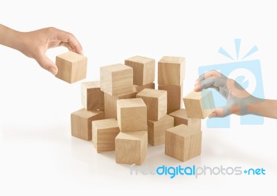 Two Hands Playing Wooden Box On Isolated Background Stock Photo