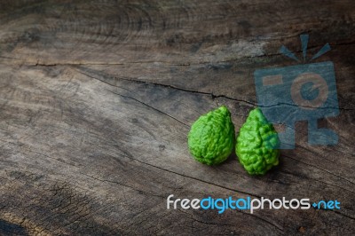 Two Leech Lime On The Old Wooden Table Stock Photo