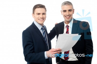 Two Managers Reading Some Documents Stock Photo