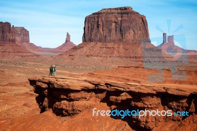 Two Men Chatting In The Desert Stock Photo