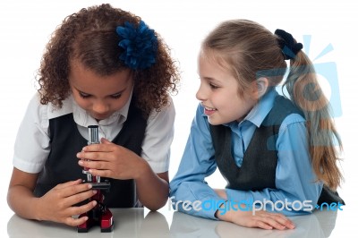 Two Pretty School Girls With Microscope Stock Photo