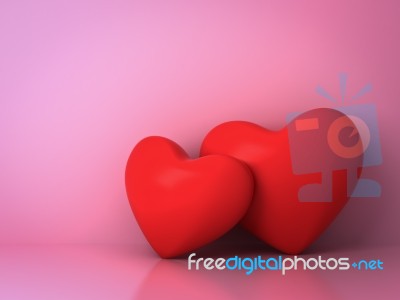 Two Red Hearts On Pink Stock Image