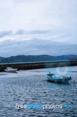 Two Small Boats In Harbor Stock Photo