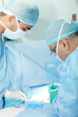 Two Surgeons Working Stock Photo