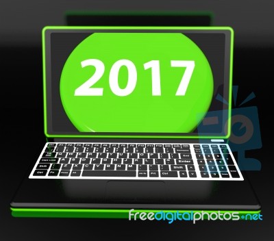 Two Thousand And Seventeen On Laptop Shows New Year Resolution 2… Stock Image