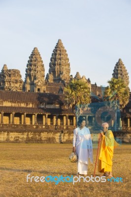 Two Unidentified Buddhist Female Monks Dressed In Orange And Whi… Stock Photo