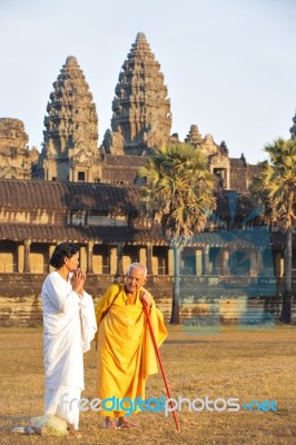 Two Unidentified Buddhist Female Monks Dressed In Orange And Whi… Stock Photo