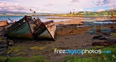 Two Wrecked Boats At Salen Isle Of Mull Stock Photo