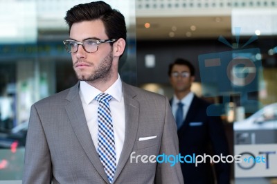 Two Young Executives Arriving At The Hotel Stock Photo