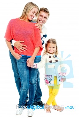 Two Young Parents With Pretty Daughter Stock Photo