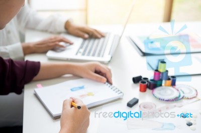 Two Young Women Working As Fashion Designers And Drawing Sketche… Stock Photo