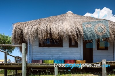 Typical Brightly Colored Hous On The Picturesque Beach In Punta Stock Photo