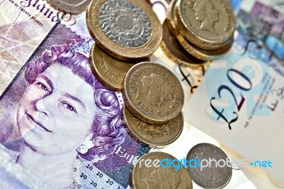 Uk Sterling Money Notes And Coins Stock Photo