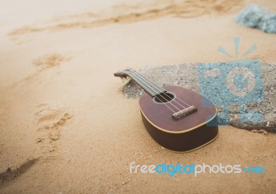 Ukulele On The Beach Stock Photo