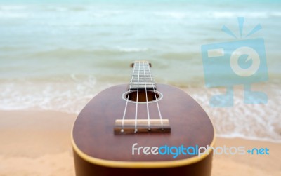 Ukulele With Beach Background Stock Photo