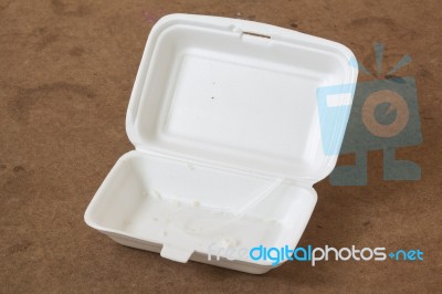 Unclean Food Foam Box With Plastic Spoon Stock Photo