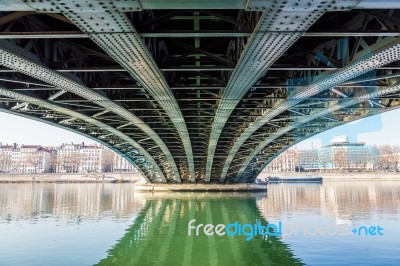 Under A Bridge With A River Stock Photo