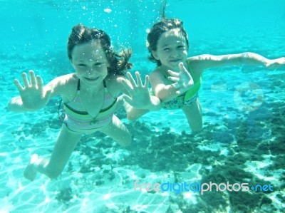 Underwater Girls Stock Photo