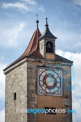 Unusual Clock Tower In Rothenburg Stock Photo