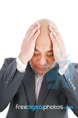 Upset Man Holding Hands On His Head Stock Photo