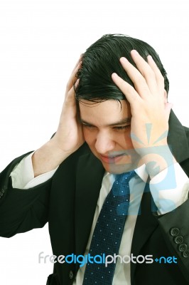 Upset Man Holding Hands On His Head Stock Photo