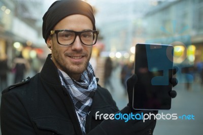 Urban Man Holdin Tablet Computer On Street Stock Photo