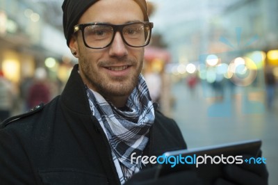 Urban Man Holdin Tablet Computer On Street Stock Photo